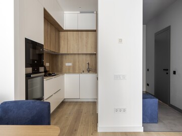 Кухня-вітальня у двокімнатній квартирі 50 м² в ЖК SEVEN — ремонт Київ